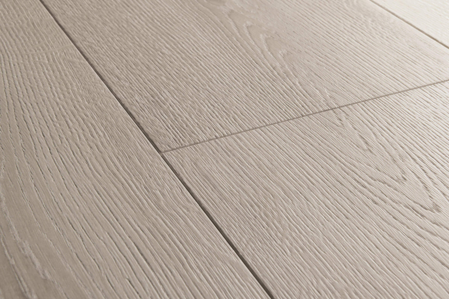 Close-up of gray wooden flooring with a visible grain pattern