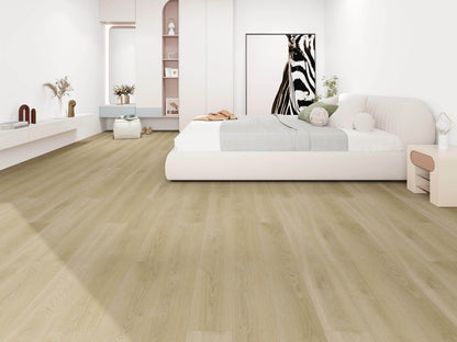 Modern bedroom with light wood flooring, white furniture, and decorative elements.