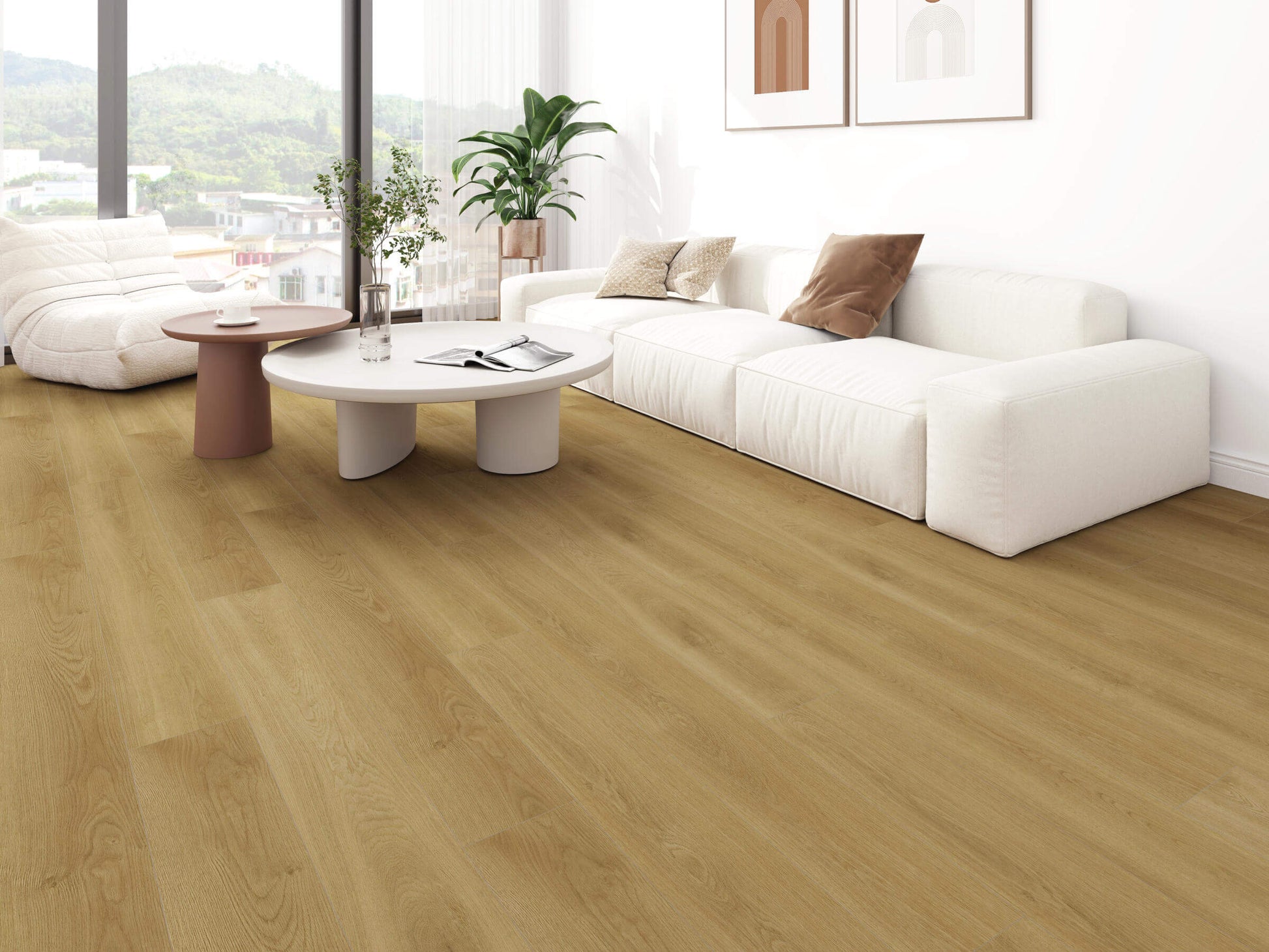 Modern living room with wooden flooring, white sofa, and decorative elements.